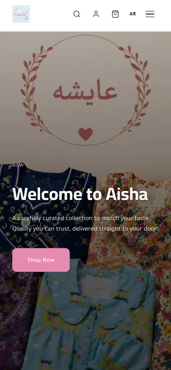 Aisha Mukhawir kidswear store on a phone
